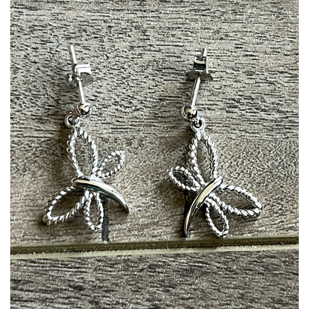925 pretty earrings. Nice detailing with the silver etched in a butterfly shape